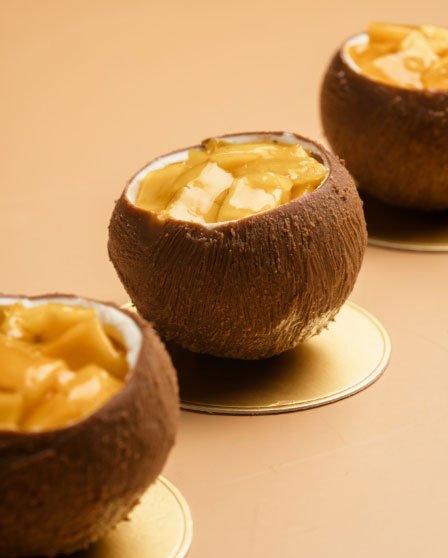 Chocolate cups filled with coconut cream