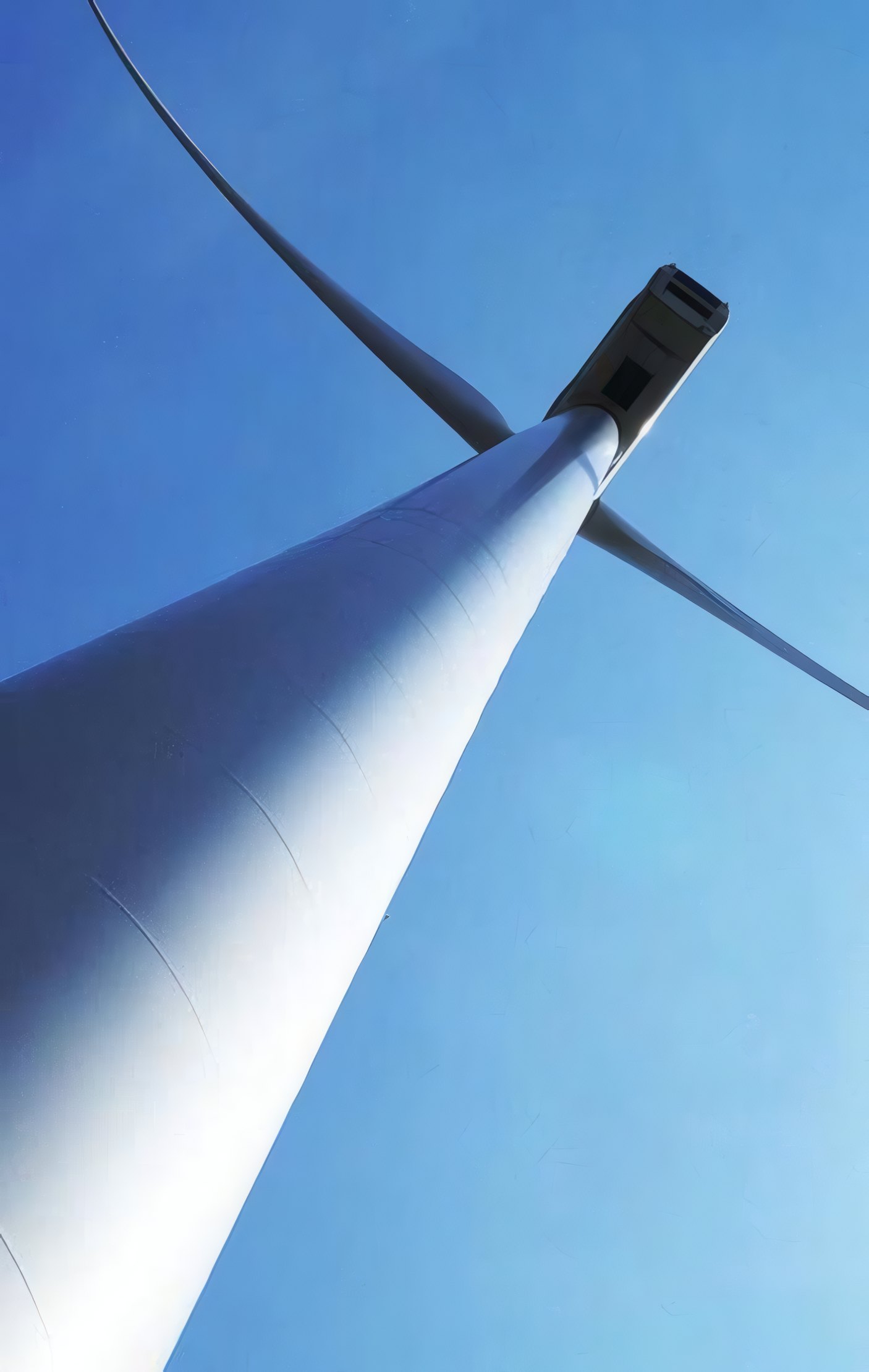 A wind turbine blade against the sky
