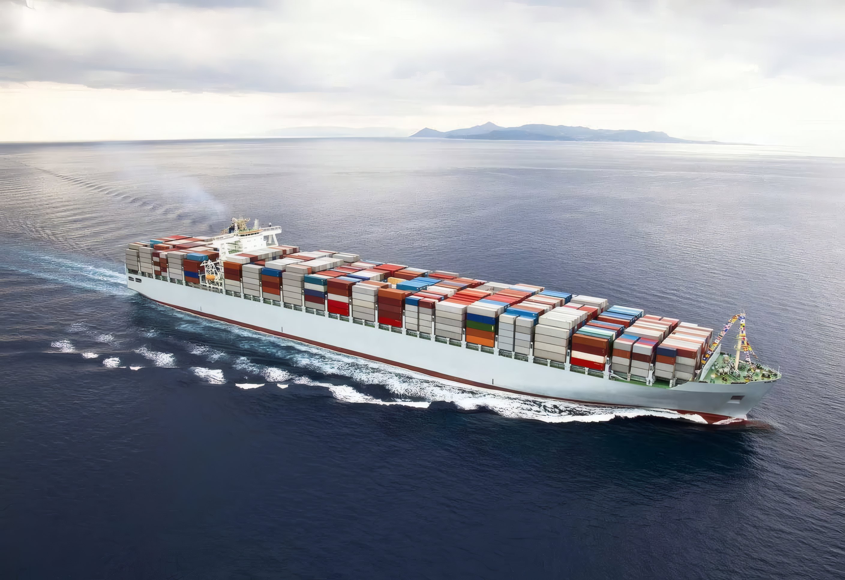 A loaded container ship at sea
