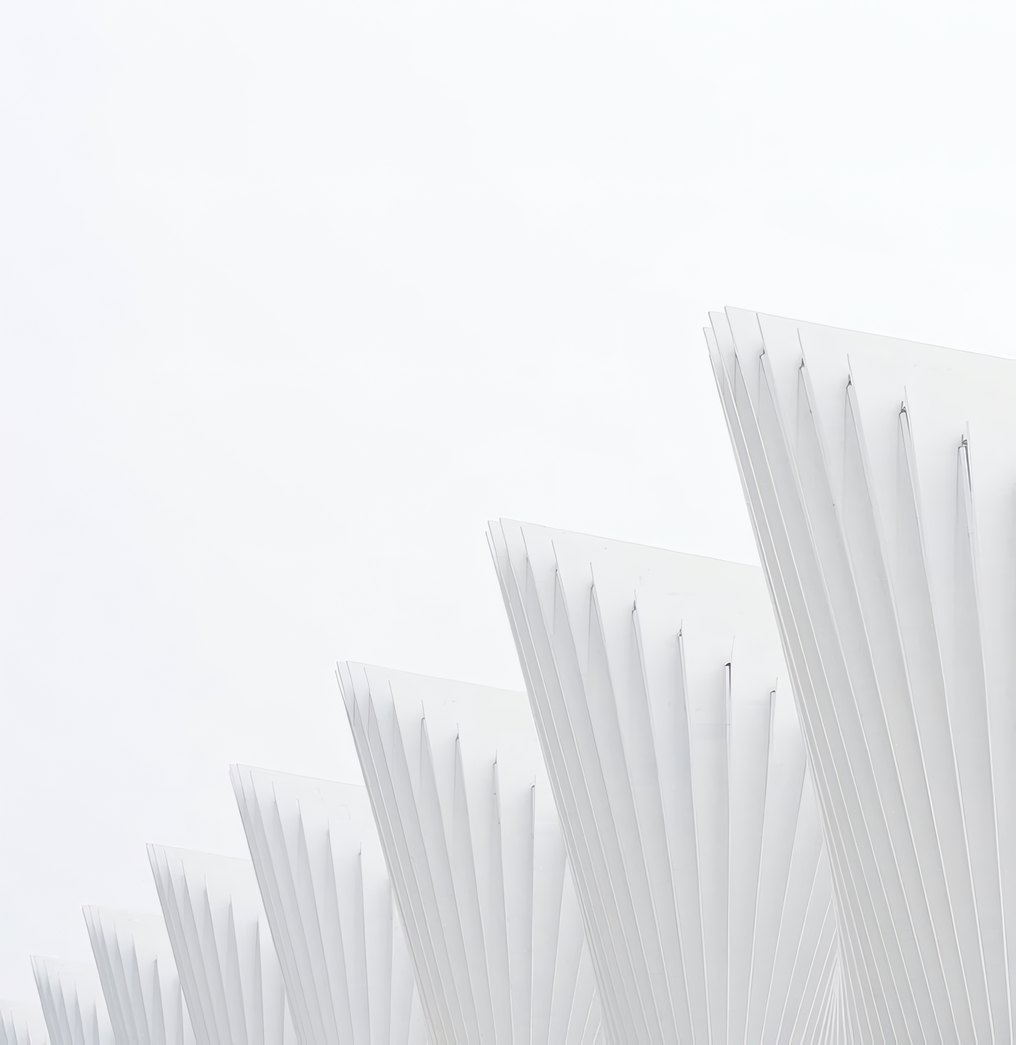 Rib Pavilion by Atelier Brise, white ribs against a pale sky