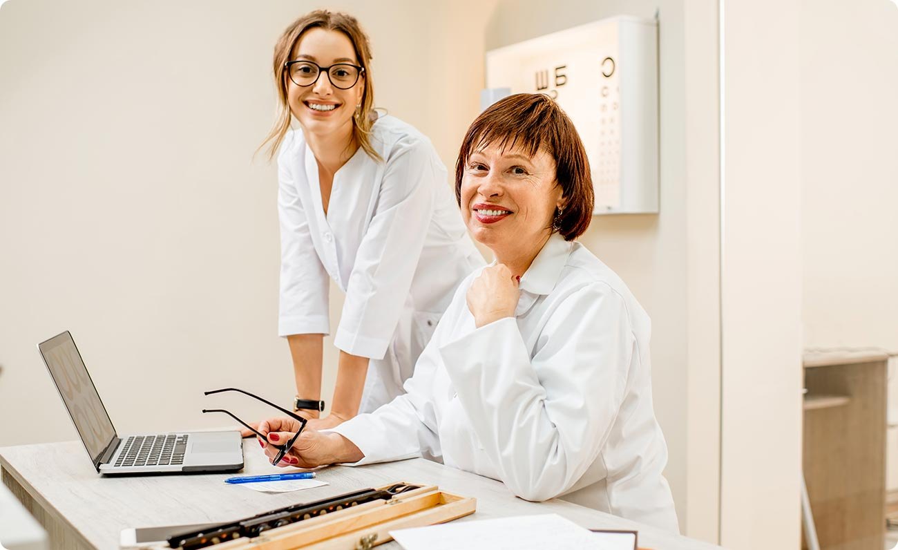 Two Vitalis doctors reviewing notes