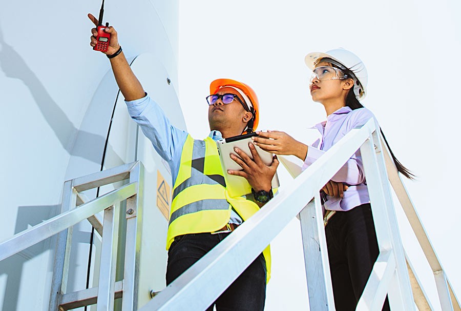 Two of the field team on a turbine platform