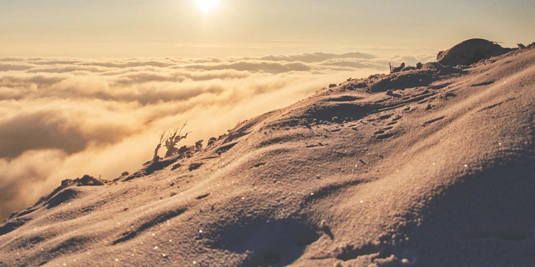 Sand dunes under the clouds at dawn