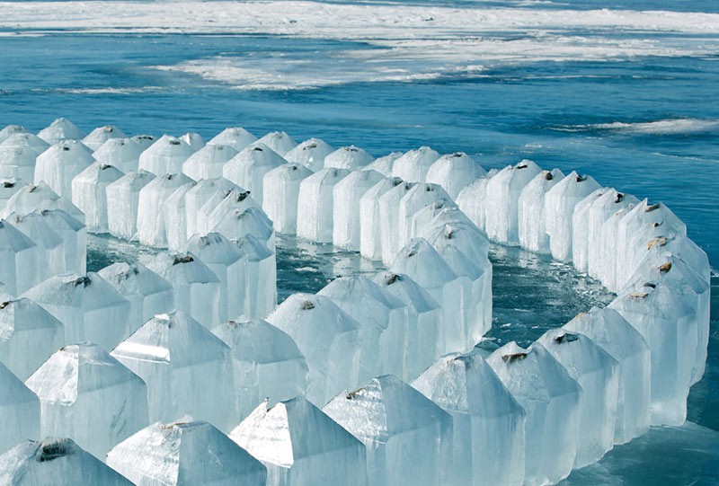 A ring of melting ice shapes on the water