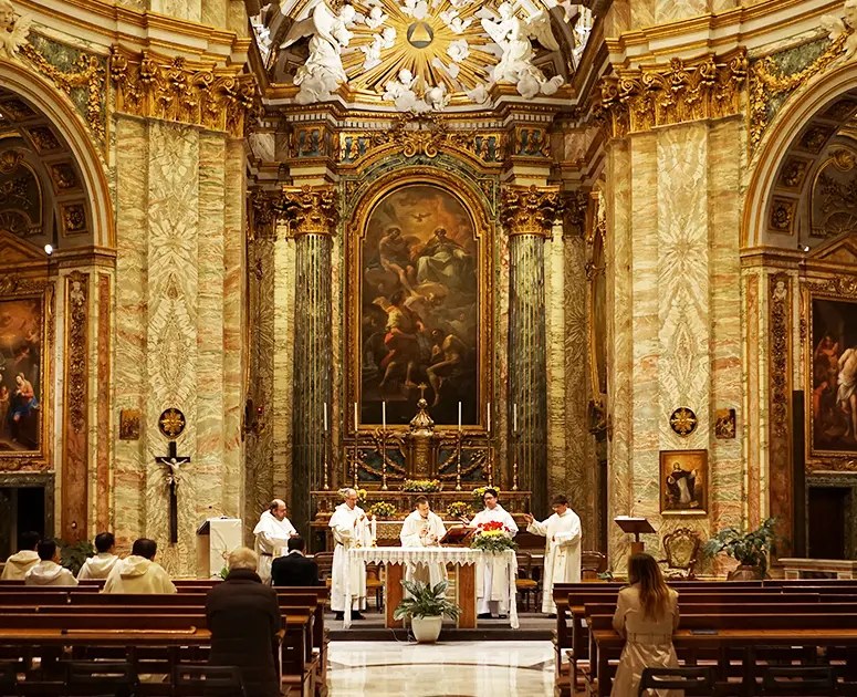 The gilded altar during a Sunday service