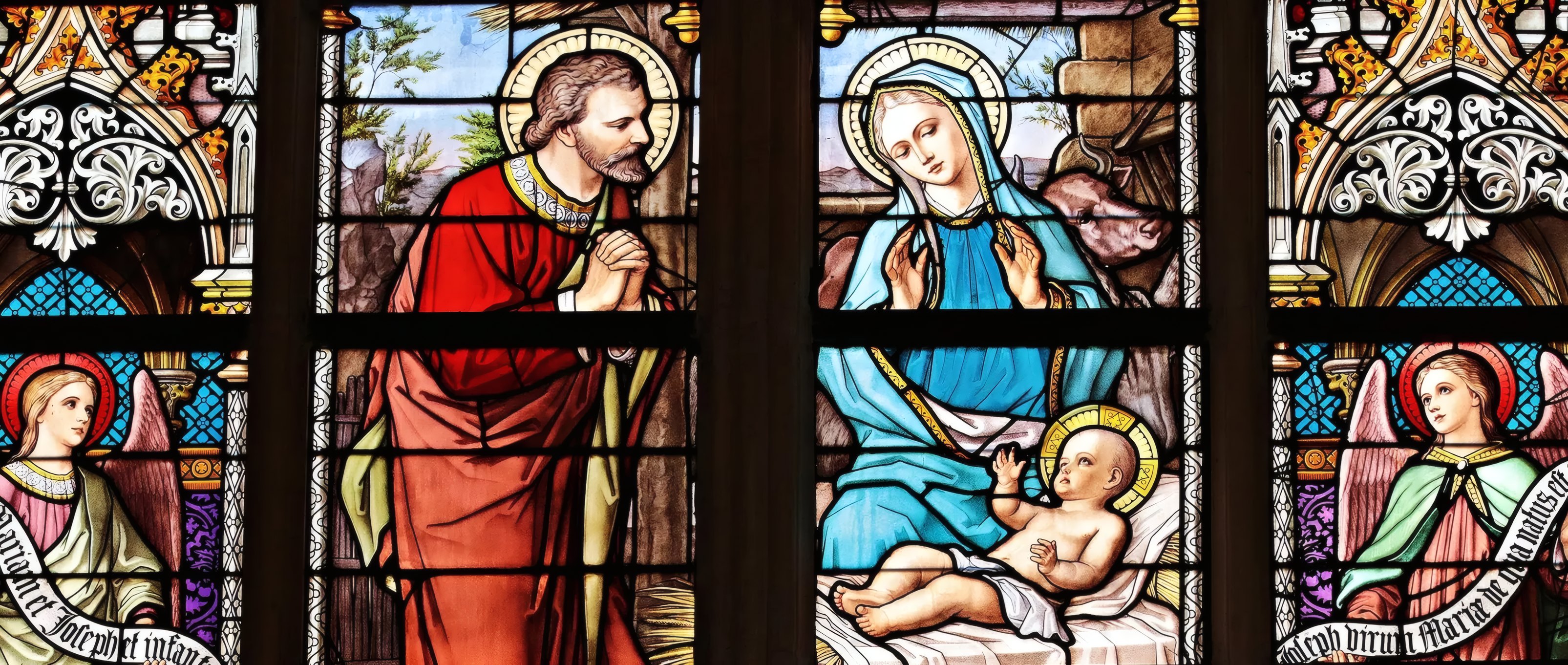 Stained glass windows of the Holy Family