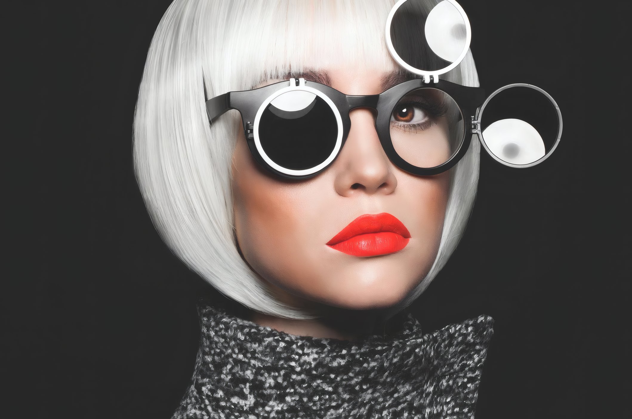 Saskia Holm in a white bob and round sunglasses