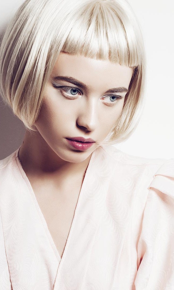 A platinum bob over a blush blouse, a look from Ribbon Hour