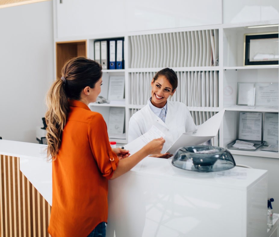 The front desk welcoming a patient