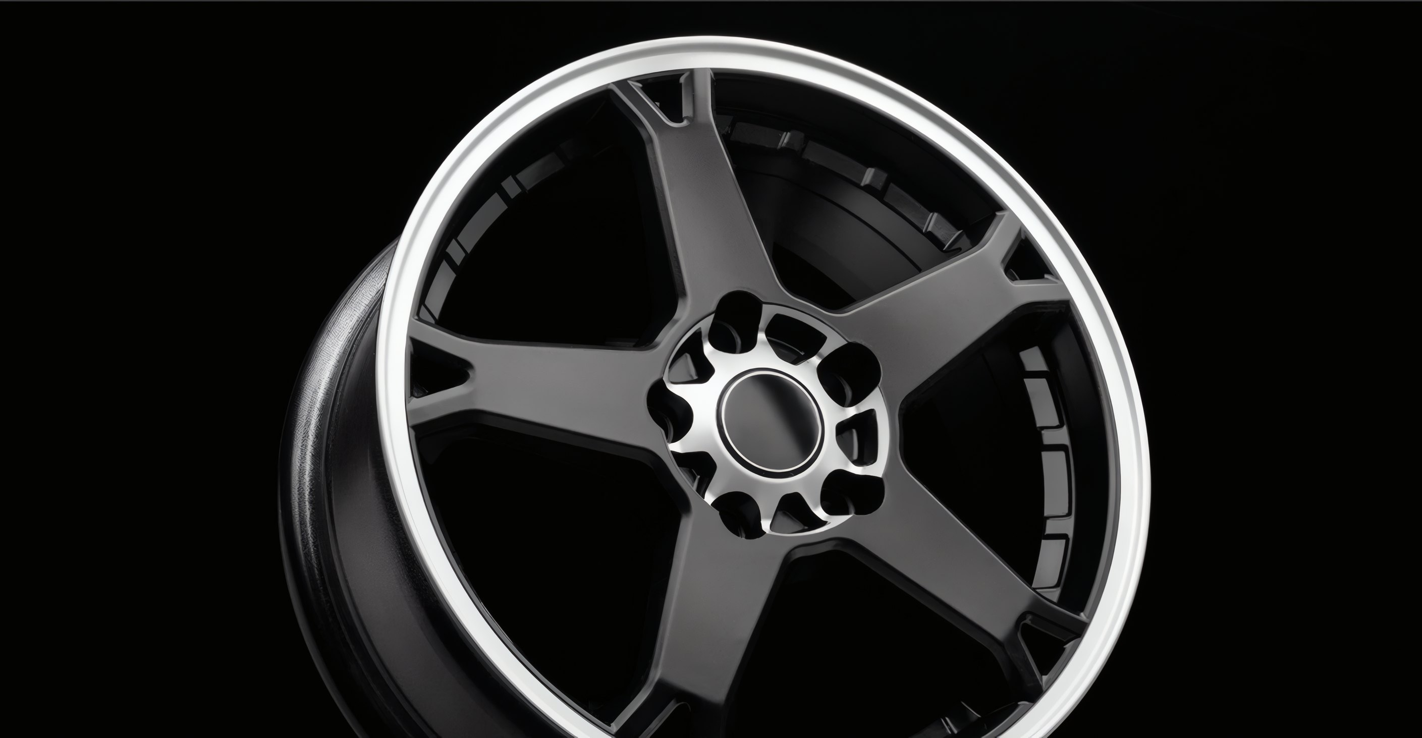A five-spoke wheel on black