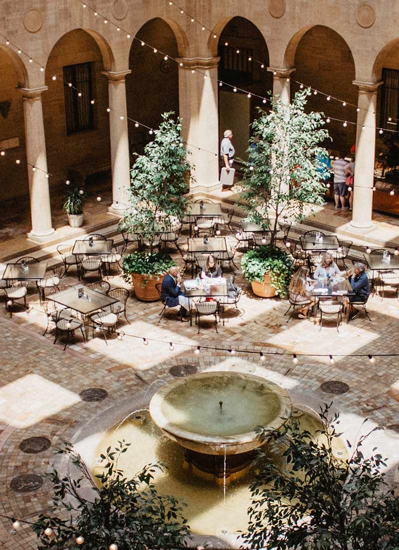 The court with its fountain and trees