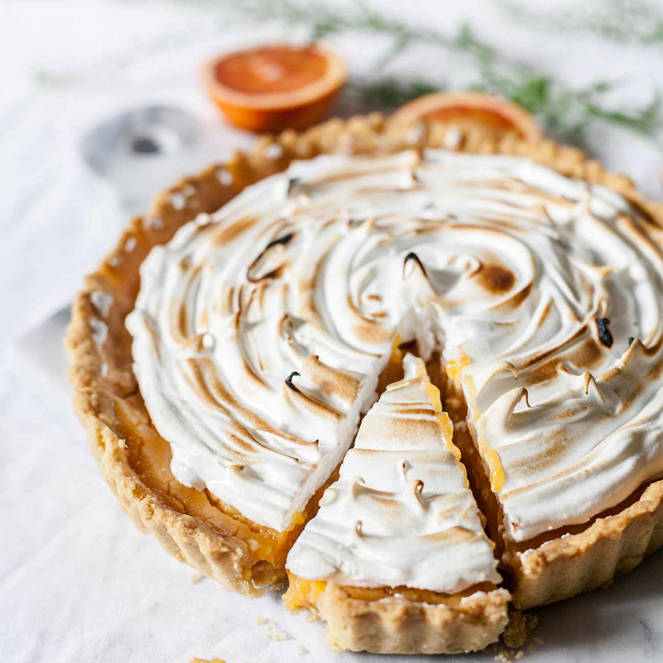 A torched lemon meringue tart seen from above