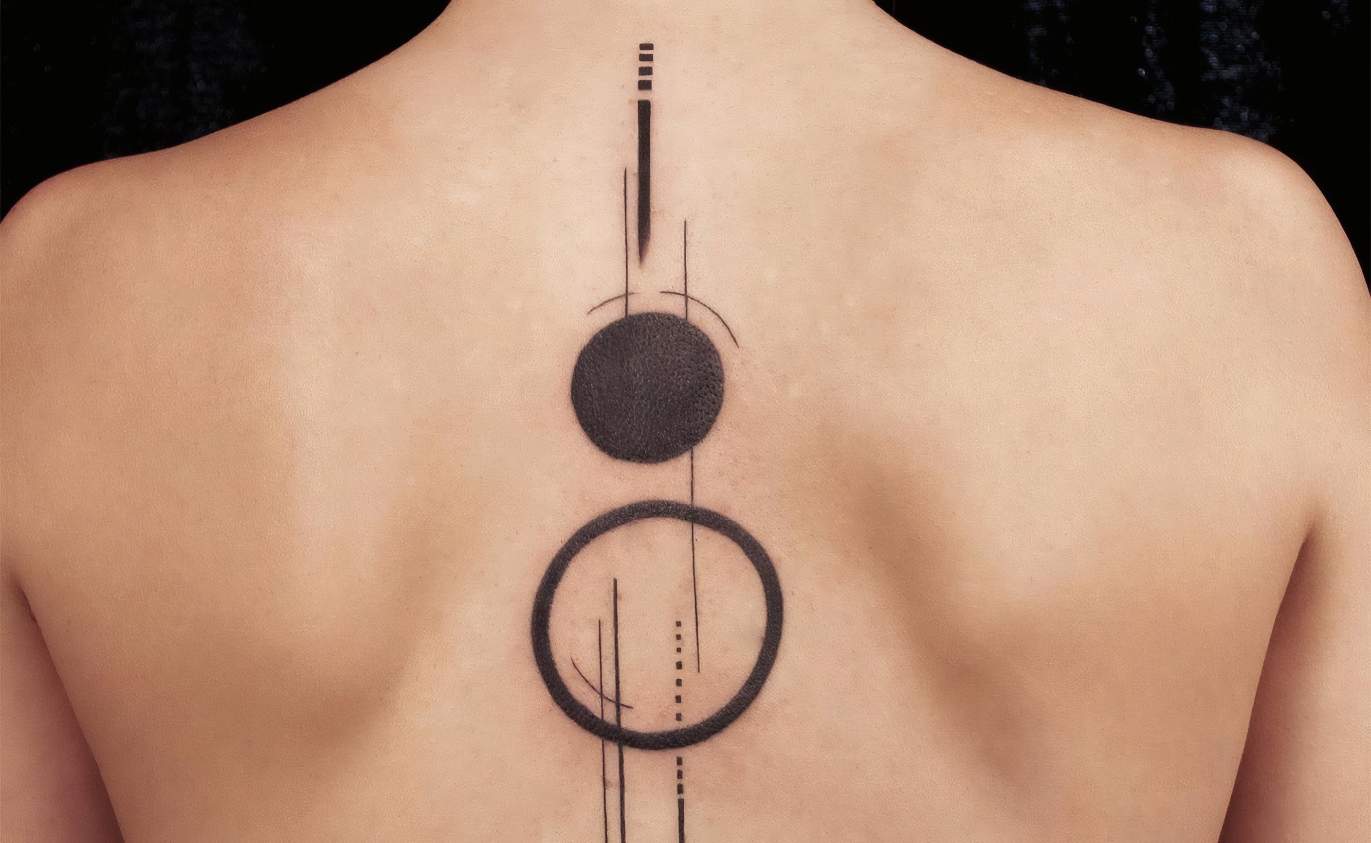 Orbit, a fine-line tattoo