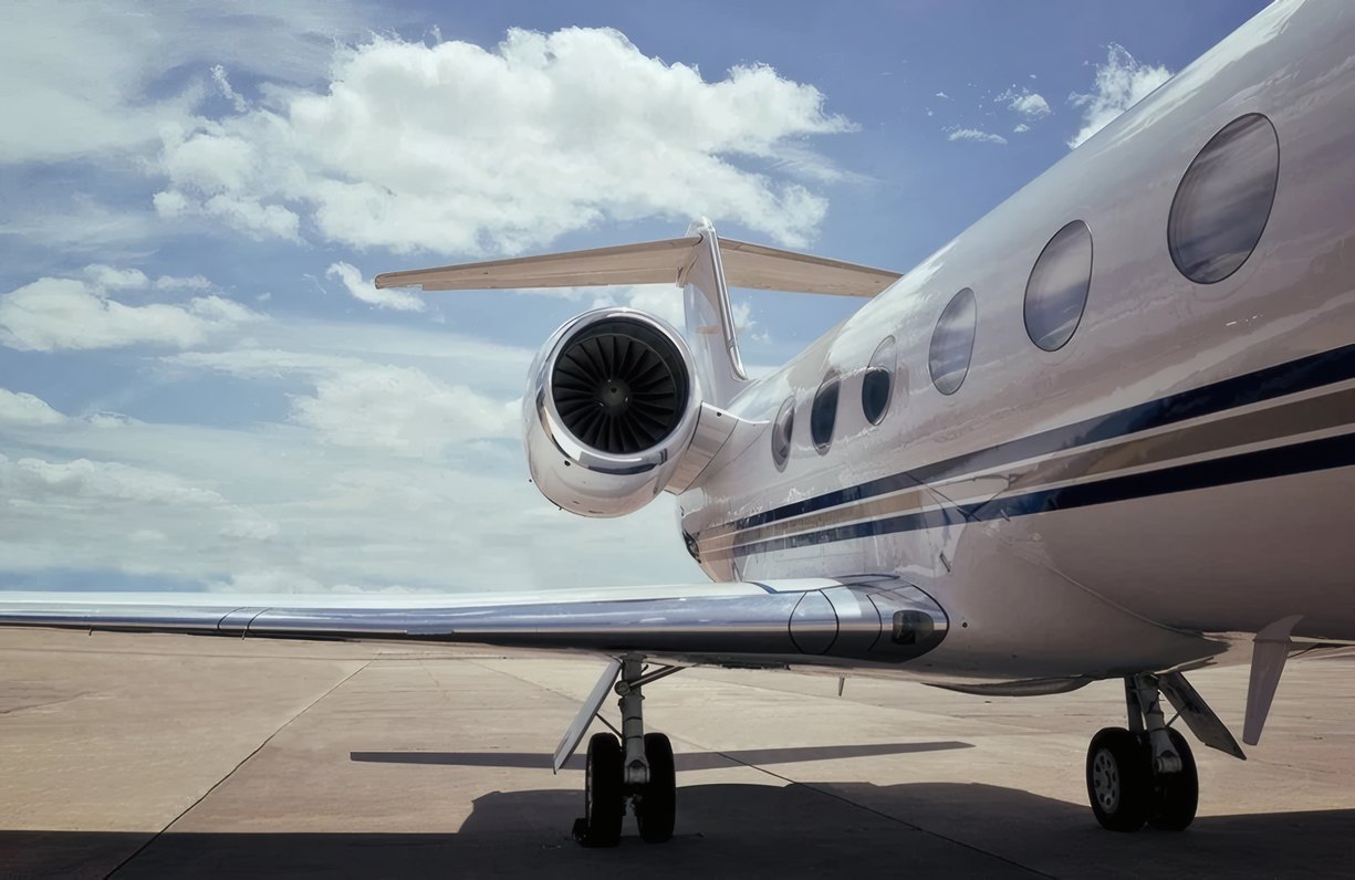 A jet parked under a clear sky