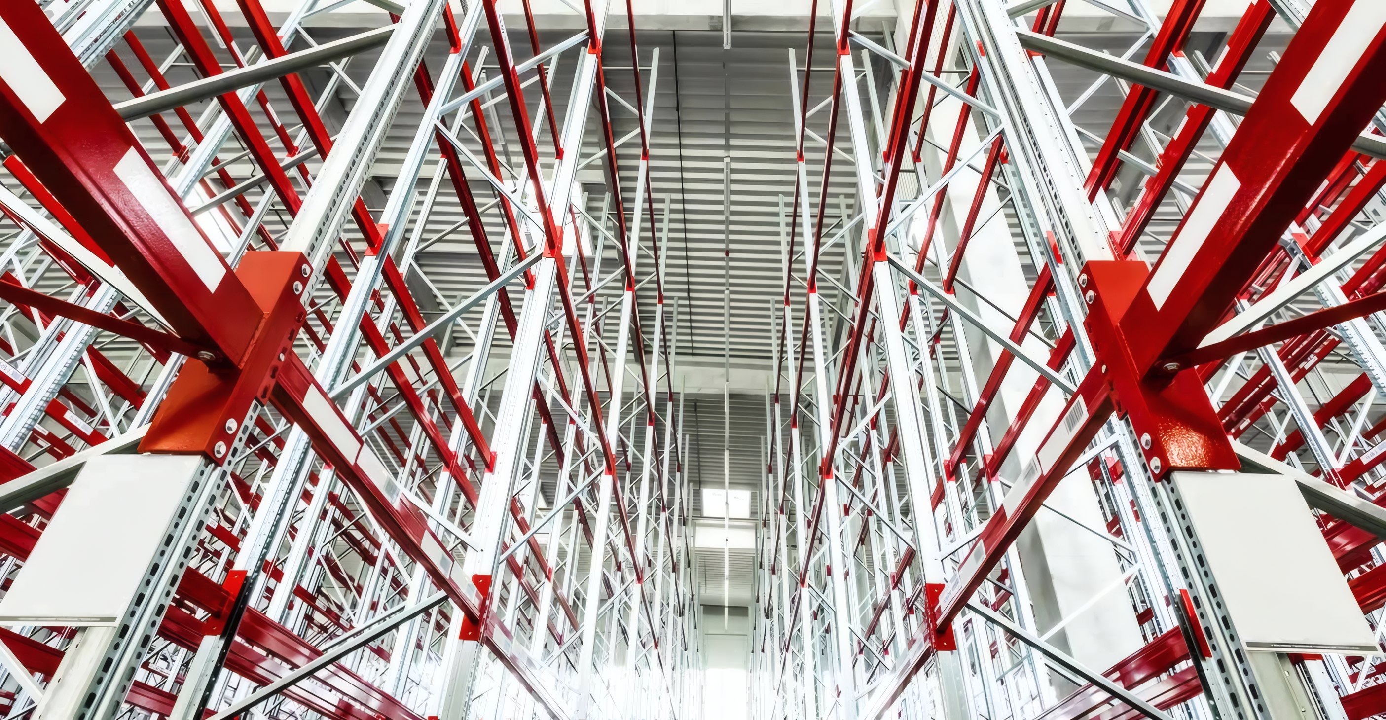 Red steel racking fabricated by Laserva
