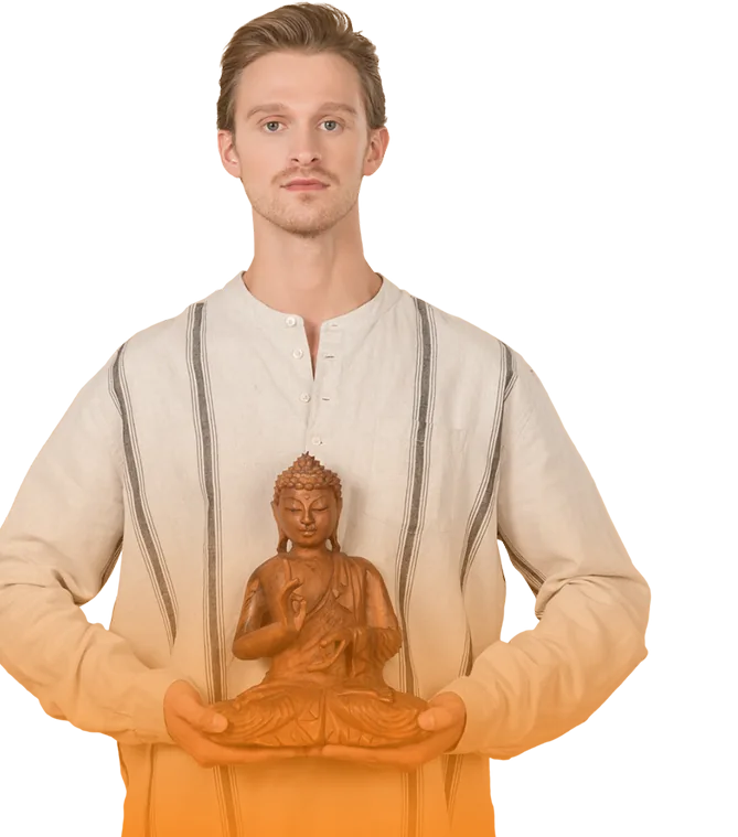 A devotee holding a carved Buddha statue