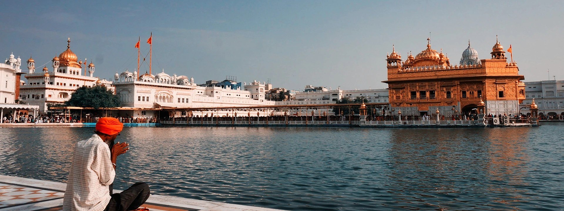 The Golden Temple at Amritsar across its sacred pool