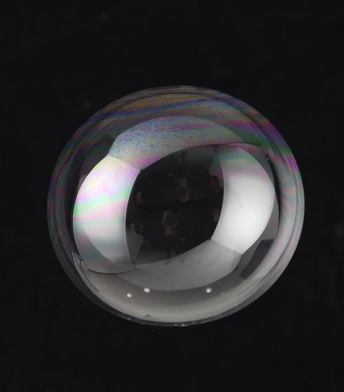 A soap bubble on black