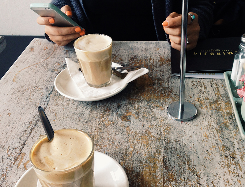 Two coffees on a marble table
