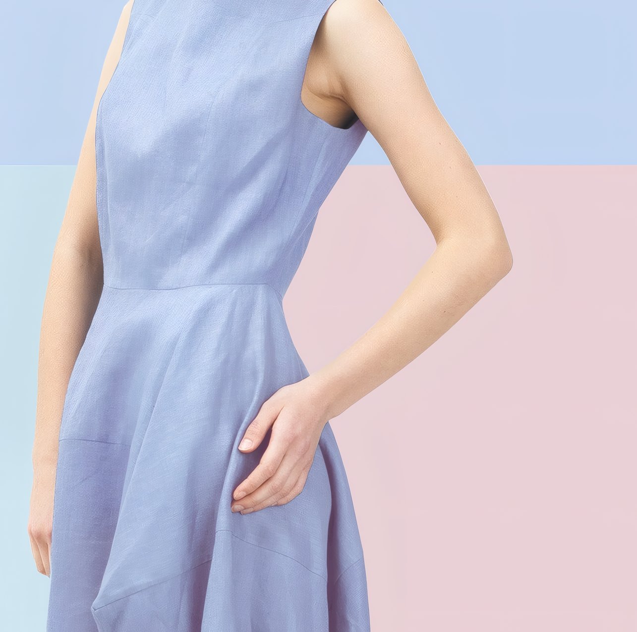 The finished dress: periwinkle linen, fitted bodice and a flared skirt, on pastel blocks