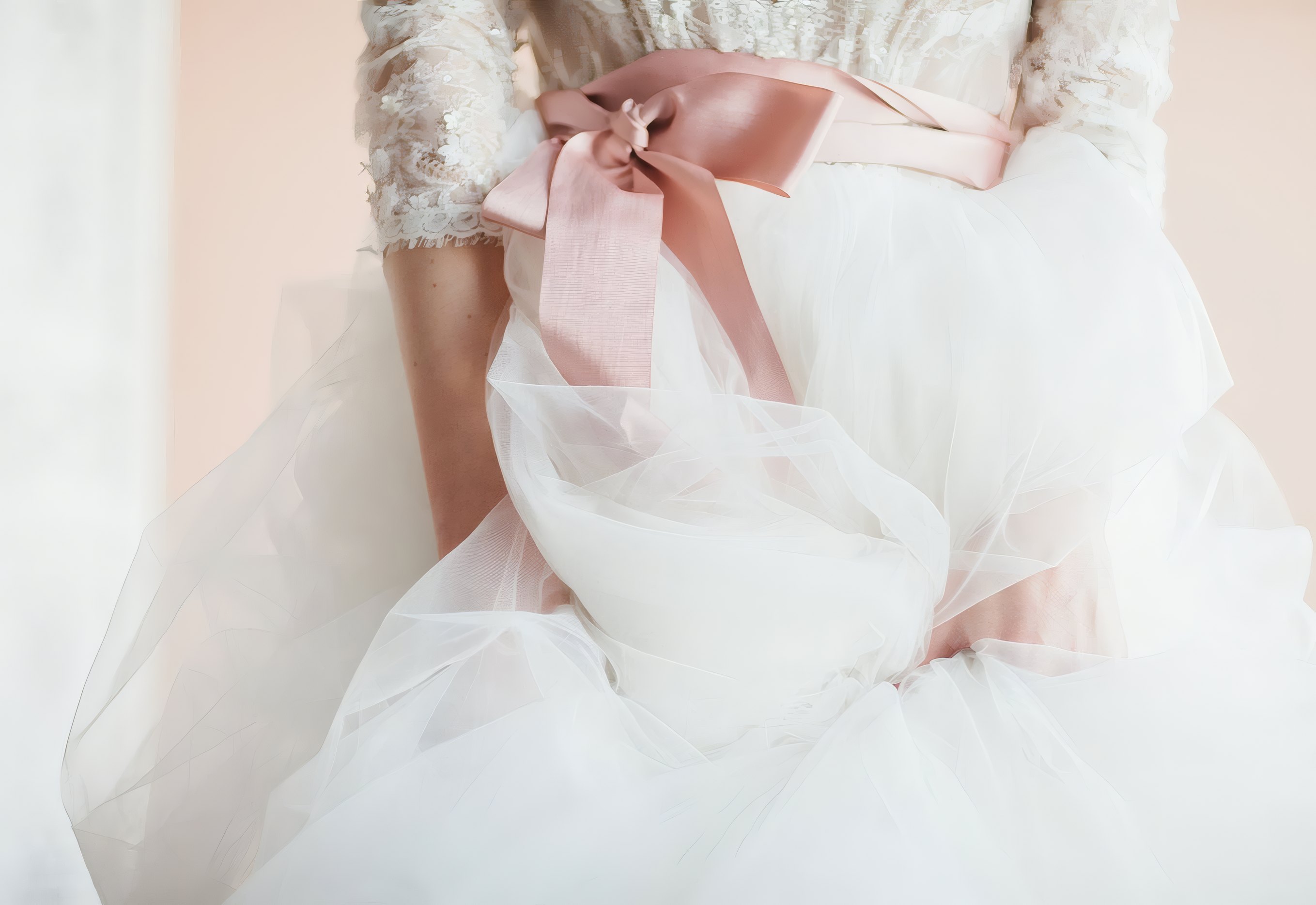 A tulle skirt with a blush ribbon, in black and white