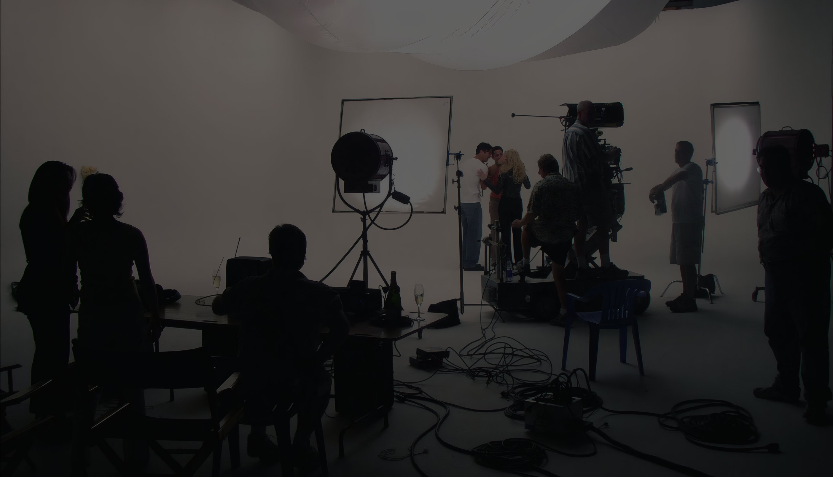A crew lighting a set in Studio One