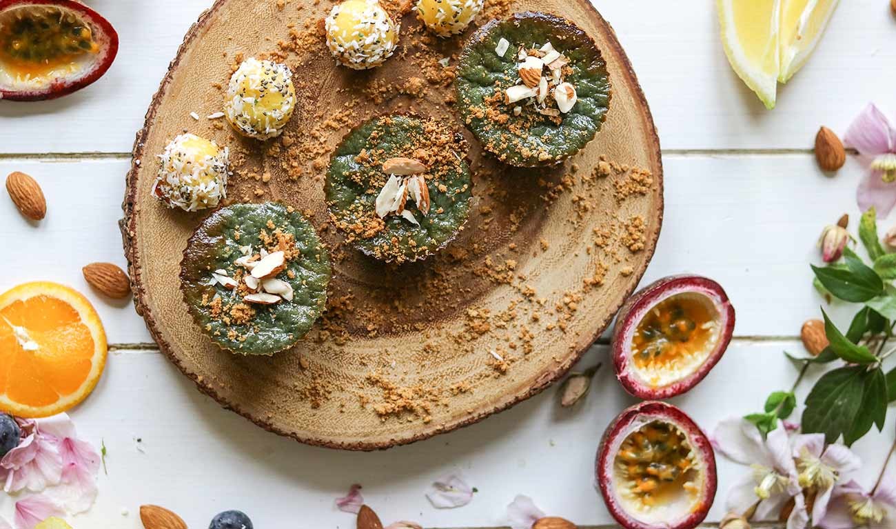 Pistachio cupcakes on a wooden board