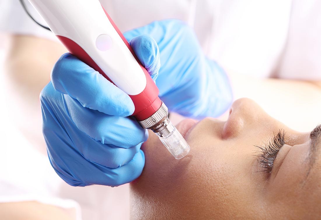 A dentist uses a drill on a patient's tooth