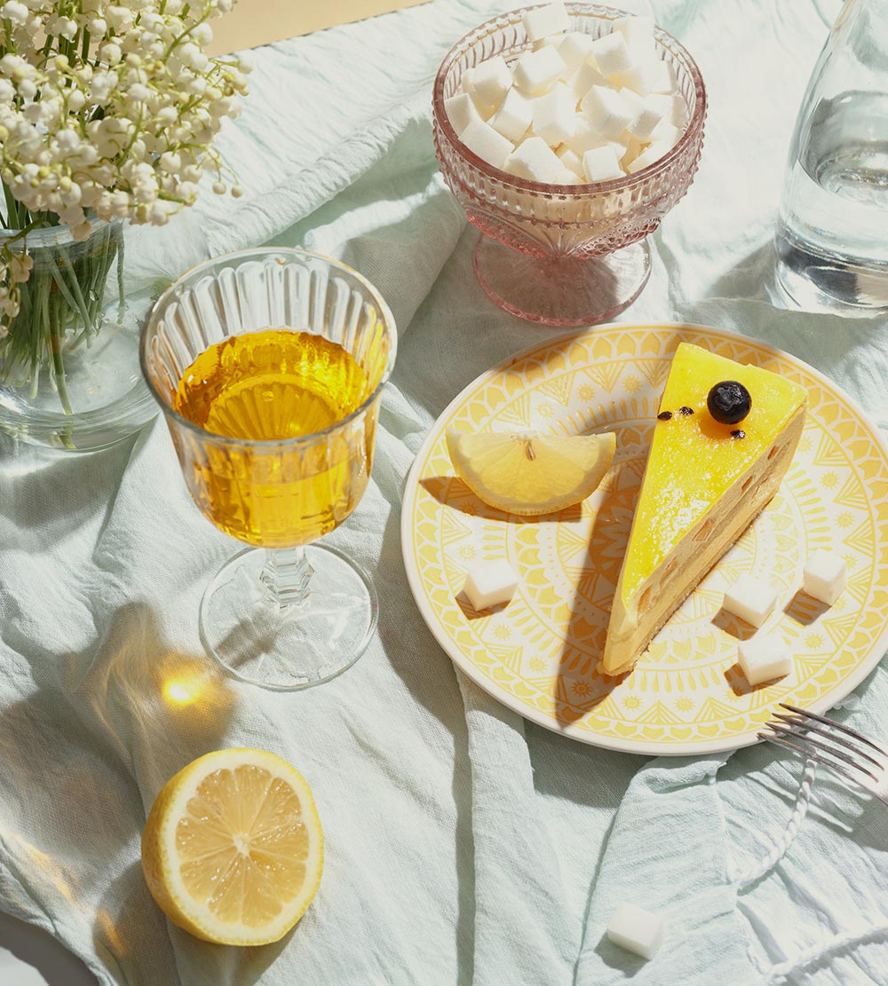 Lemon cake and a glass of white wine