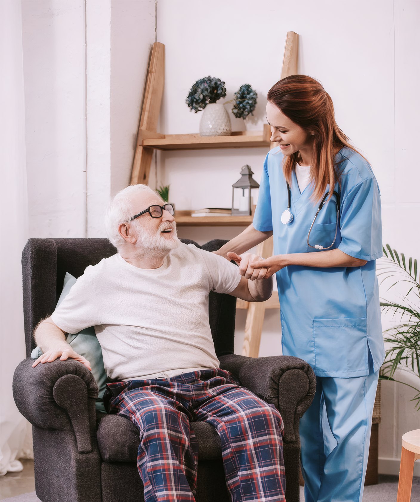 A nurse and a resident laughing together