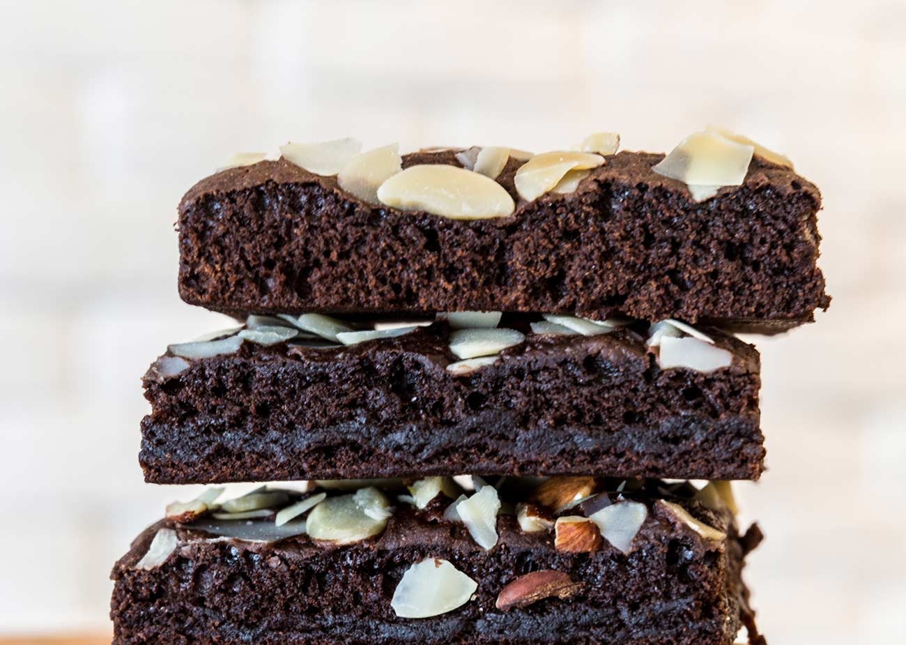 Brownies stacked on a board