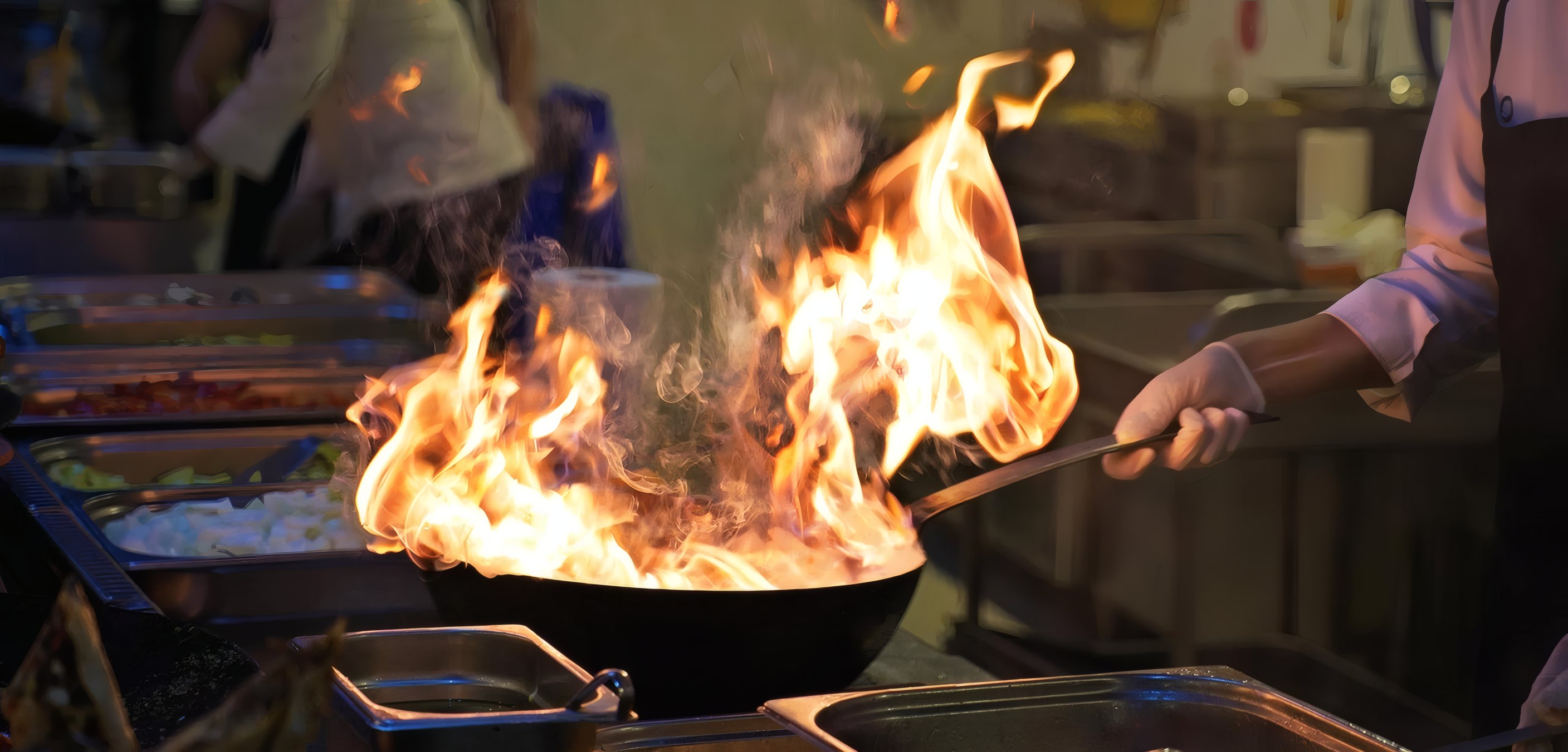 Flames leaping from a pan on the stove