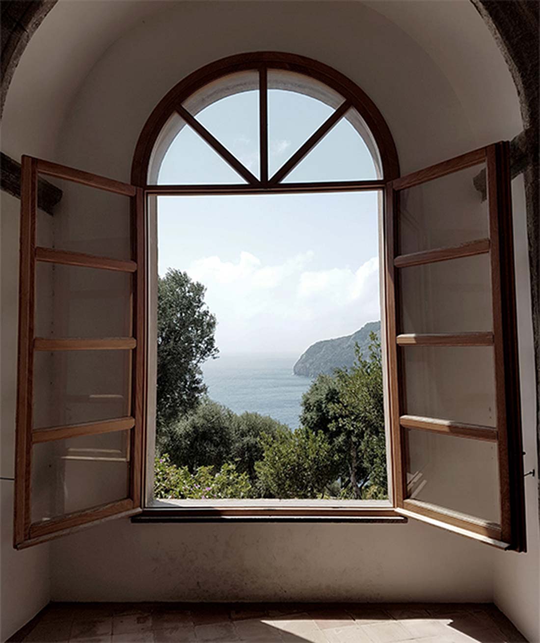 The library window of the club room, open onto the sea