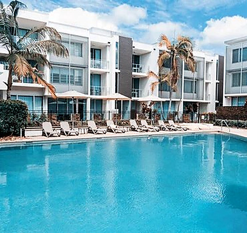 The lazy river curling past the pool villas