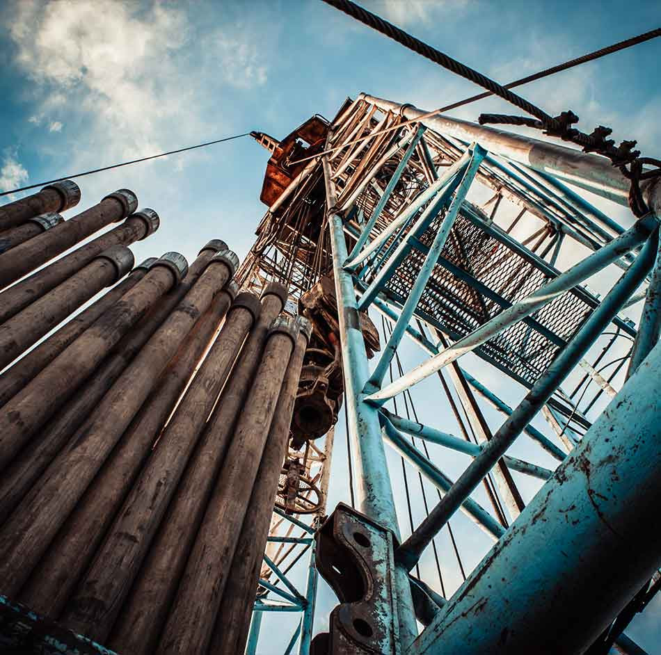 Drill pipe racked in a derrick