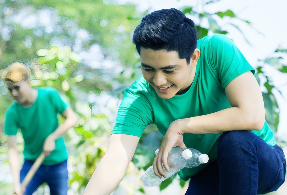 A volunteer clearing a stream bank