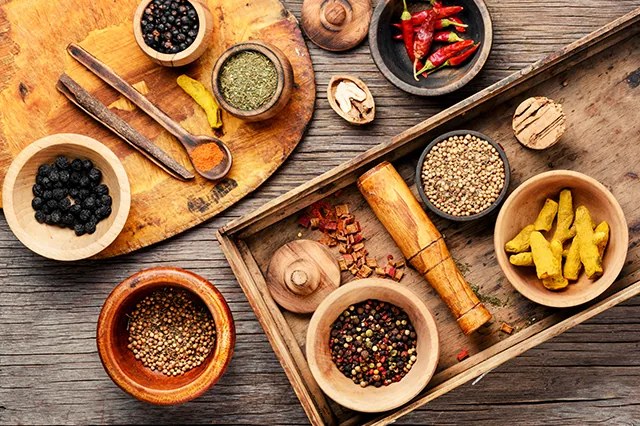 Whole spices in bowls